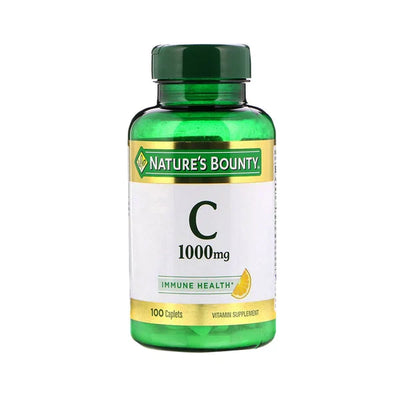 A bottle of Nature's Bounty Vitamin C 1000mg with 100 veg caplets, predominantly green and white with product information and branding.