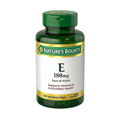 A bottle of Nature's Bounty Vitamin E 180mg softgels with a green and white label.