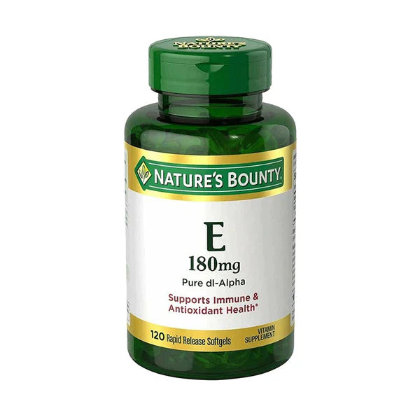A bottle of Nature's Bounty Vitamin E 180mg softgels with a green and white label.