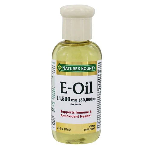 A bottle of Nature's Bounty Vitamin E Oil, 30,000 IU with a white label, green and orange branding, and a white cap.